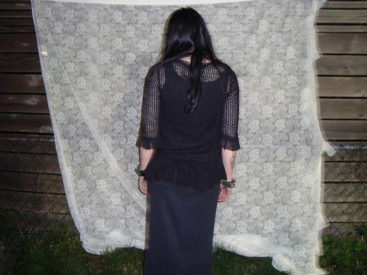 black loose knit mesh ruffle blouse